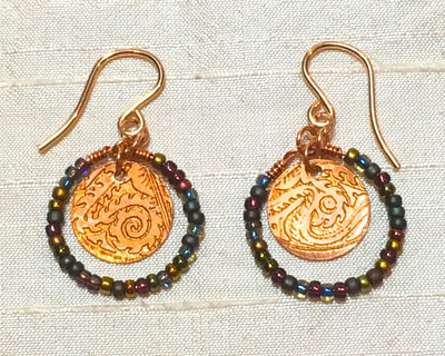 C.Tres Prehispanic Panama design hand engraved copper earrings with Japanese seed beads