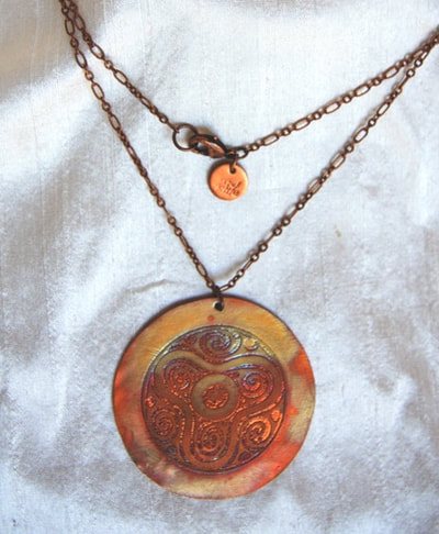 C. Tres Engraved Copper Necklace